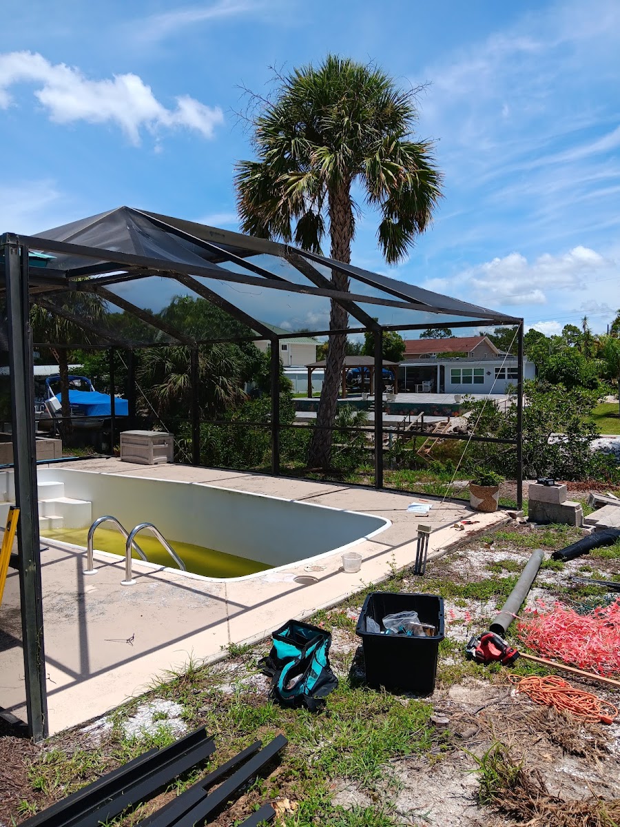Pool cage frame and screen material during repair work